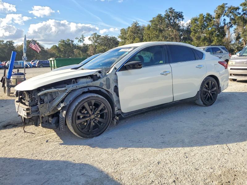 NISSAN ALTIMA 2017 with VIN 1N4AL3AP7HN336709 - Photo from auction