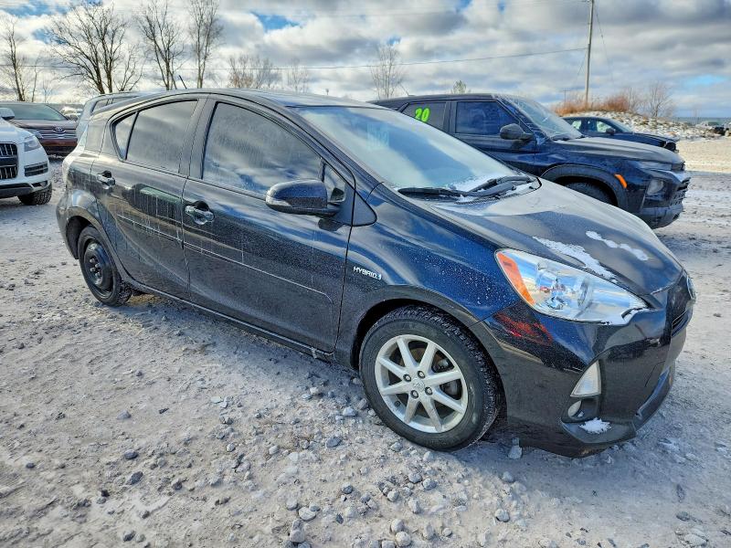 Photo 4 from auction – 2013 TOYOTA PRIUS C with VIN JTDKDTB37D1044793