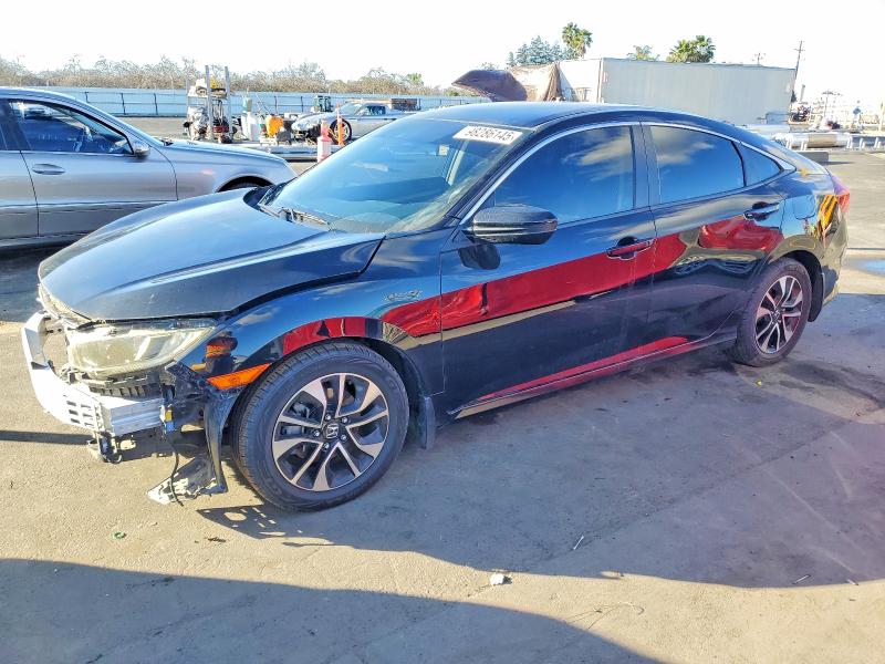 HONDA CIVIC LX 2020 with VIN 19XFC2F62LE209101 - Photo from auction