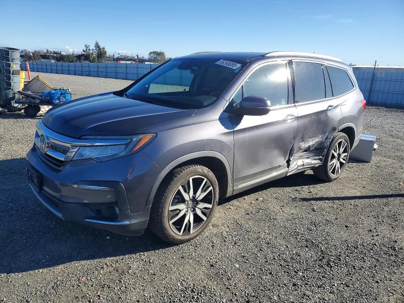 Photo 1 from auction – 2019 HONDA PILOT TOUR with VIN 5FNYF5H61KB006207