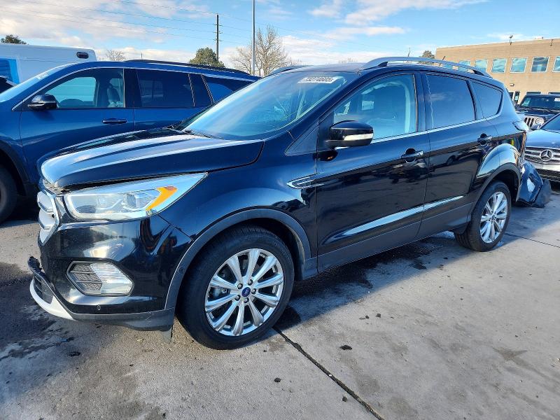 FORD ESCAPE 2018 with VIN 1FMCU9J9XJUA85633 - Photo from auction