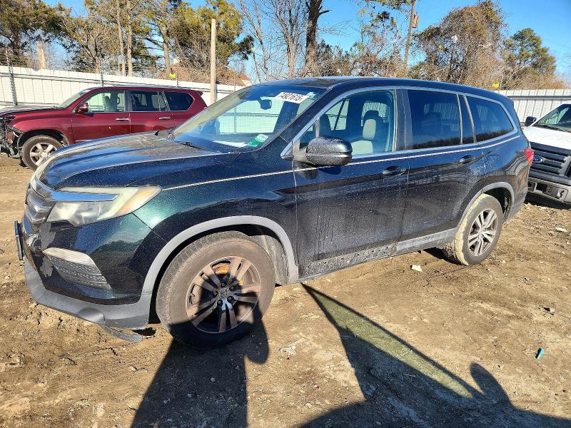 HONDA PILOT EXL 2016 with VIN 5FNYF5H65GB010087 - Photo from auction