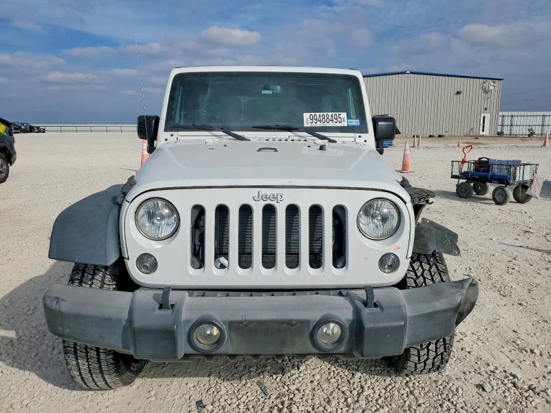 Photo 5 from auction – 2016 JEEP WRANGLER U with VIN 1C4BJWDG5GL204592