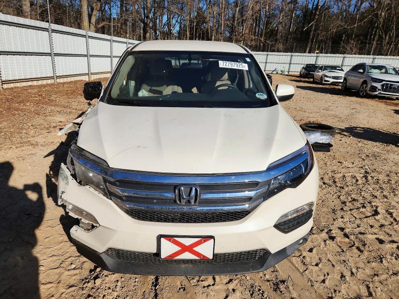 Photo 5 from auction – 2016 HONDA PILOT EX with VIN 5FNYF6H37GB111238