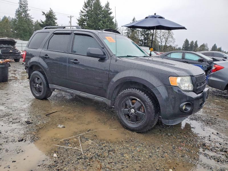 Photo 4 from auction – 2011 FORD ESCAPE XLT with VIN 1FMCU0DG7BKA33699