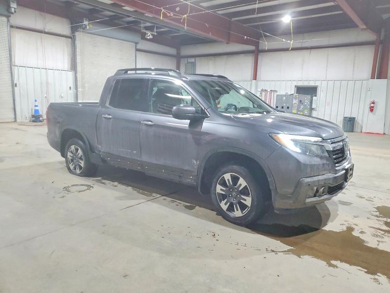 Photo 4 from auction – 2017 HONDA RIDGELINE with VIN 5FPYK3F77HB029258