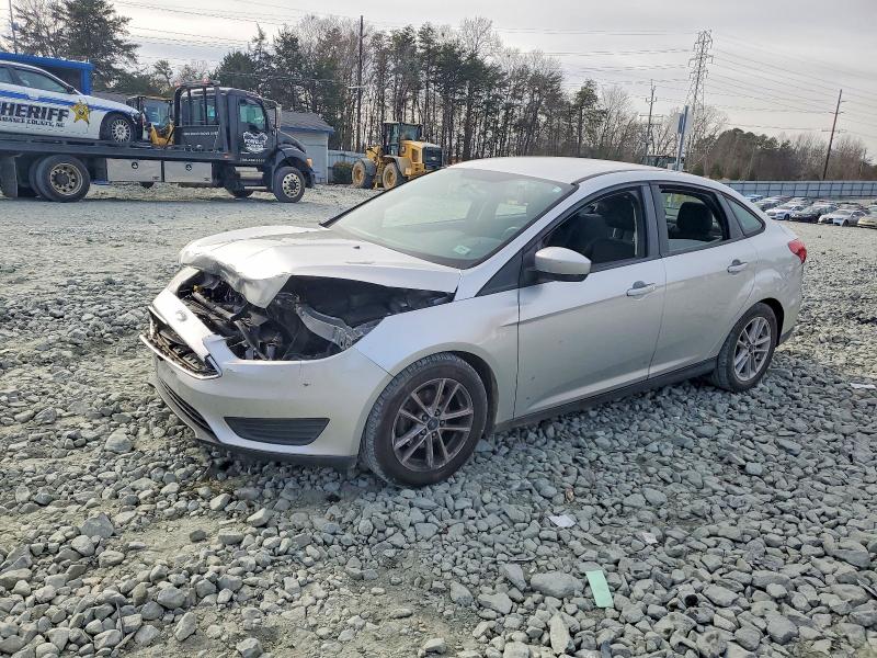 FORD FOCUS SE 2018 with VIN 1FADP3F27JL251594 - Photo from auction