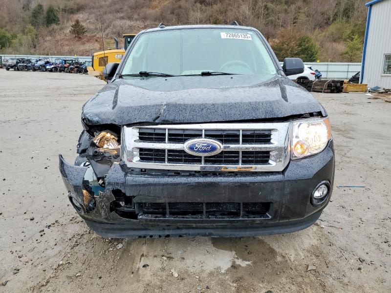 Photo 5 from auction – 2011 FORD ESCAPE with VIN 1FMCU0D75BKC25770