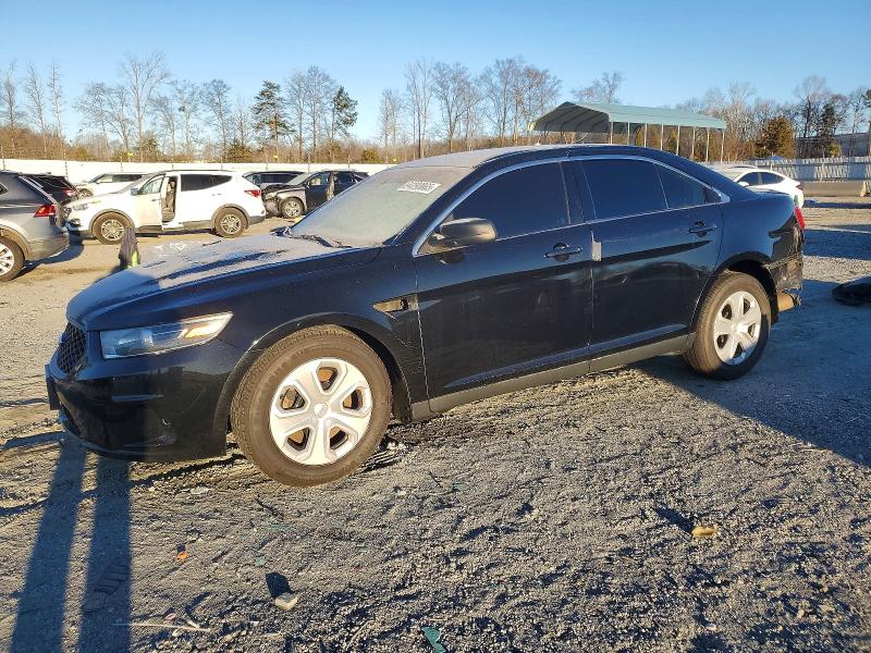 FORD TAURUS POL 2015 with VIN 1FAHP2MK7FG195624 - Photo from auction