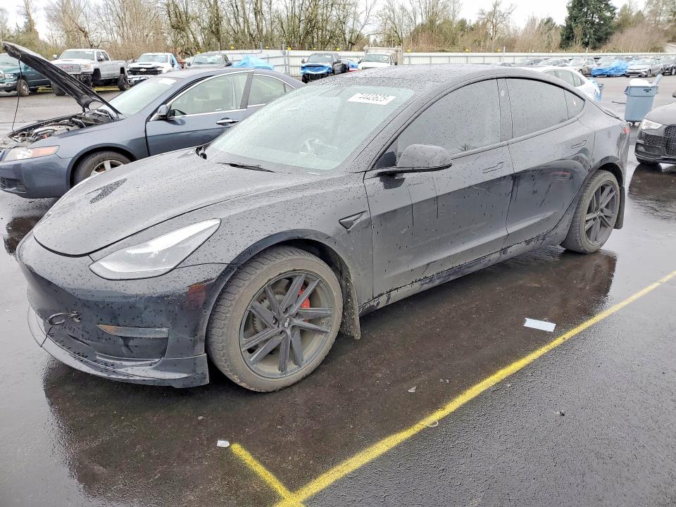 TESLA MODEL 3 2022 with VIN 5YJ3E1ECXNF123515 - Photo from auction