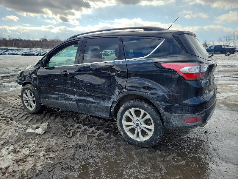 Photo 2 from auction – 2018 FORD ESCAPE SE with VIN 1FMCU9GD6JUA32214