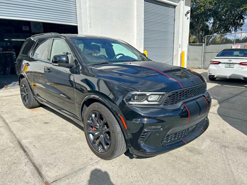 DODGE DURANGO SR 2023 with VIN 1C4SDJGJ9PC601482 - Photo from auction