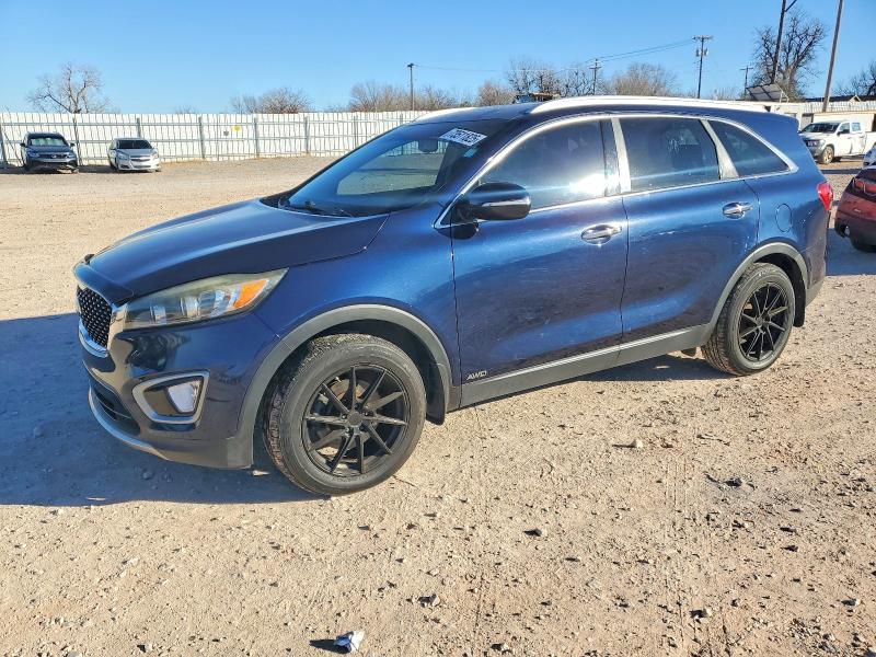KIA SORENTO EX 2017 with VIN 5XYPHDA12HG276725 - Photo from auction