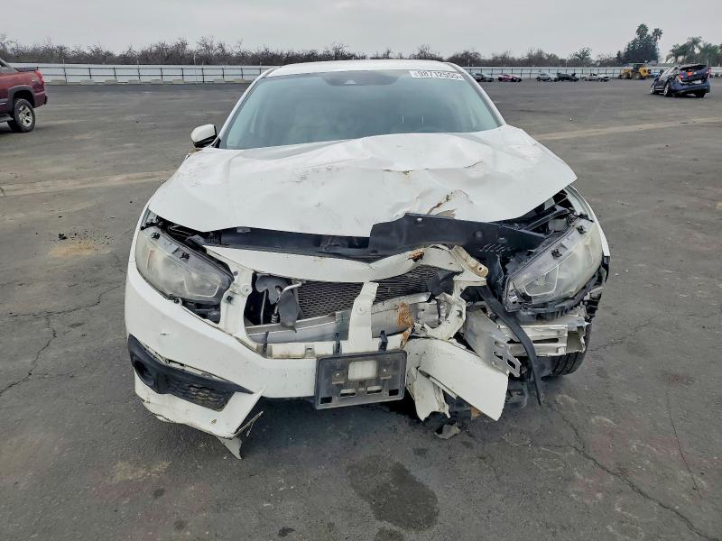 Photo 5 from auction – 2018 HONDA CIVIC LX with VIN 2HGFC2F69JH540194