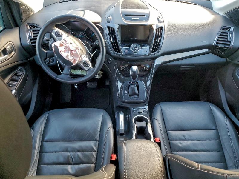 Photo 8 from auction – 2016 FORD ESCAPE TIT with VIN 1FMCU9J95GUC63375