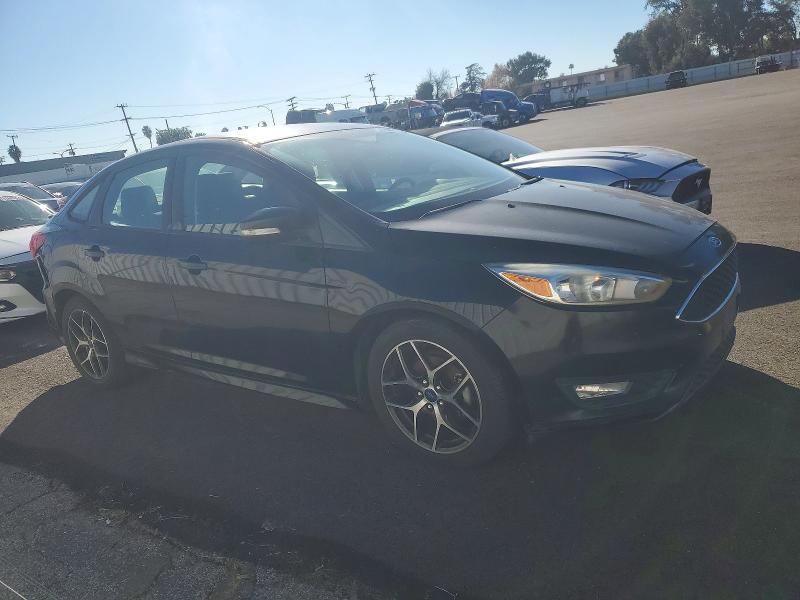 Photo 4 from auction – 2016 FORD FOCUS SE with VIN 1FADP3F21GL384165