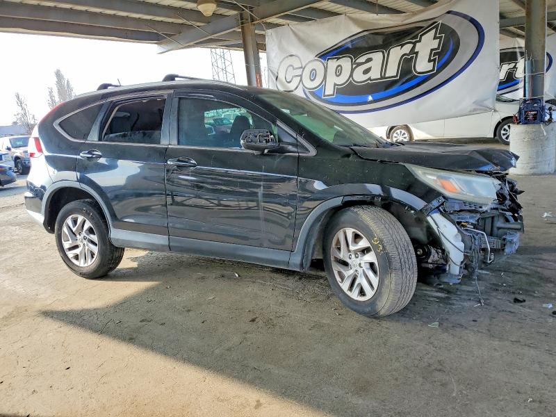 Photo 4 from auction – 2016 HONDA CR-V EXL with VIN 2HKRM3H73GH509656