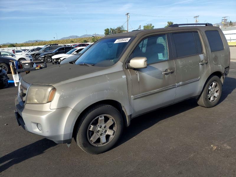 HONDA PILOT TOUR 2011 مع رقم تعريف المركبة 5FNYF4H90BB062644 - صورة من المزاد