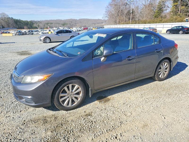 HONDA CIVIC EXL 2012 z numerem VIN 19XFB2F99CE023648 - Zdjęcie z aukcji