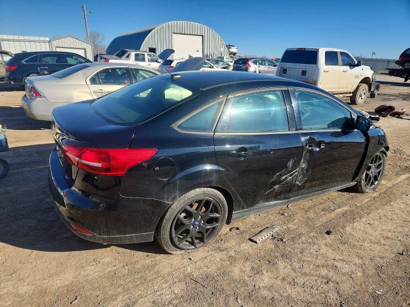 Photo 3 from auction – 2016 FORD FOCUS with VIN 1FADP3F24GL357090