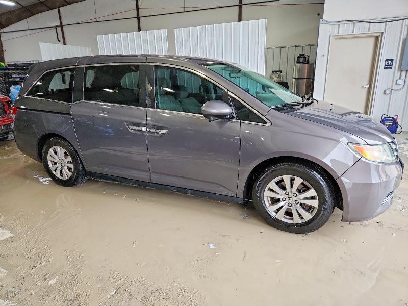Photo 4 from auction – 2016 HONDA ODYSSEY with VIN 5FNRL5H31GB033482