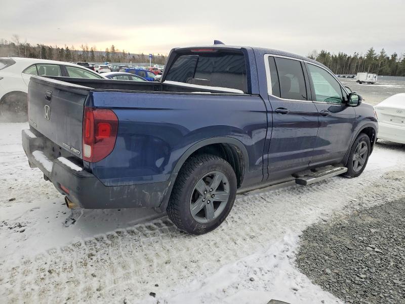 Photo 3 from auction – 2021 HONDA RIDGELINE with VIN 5FPYK3F76MB500620