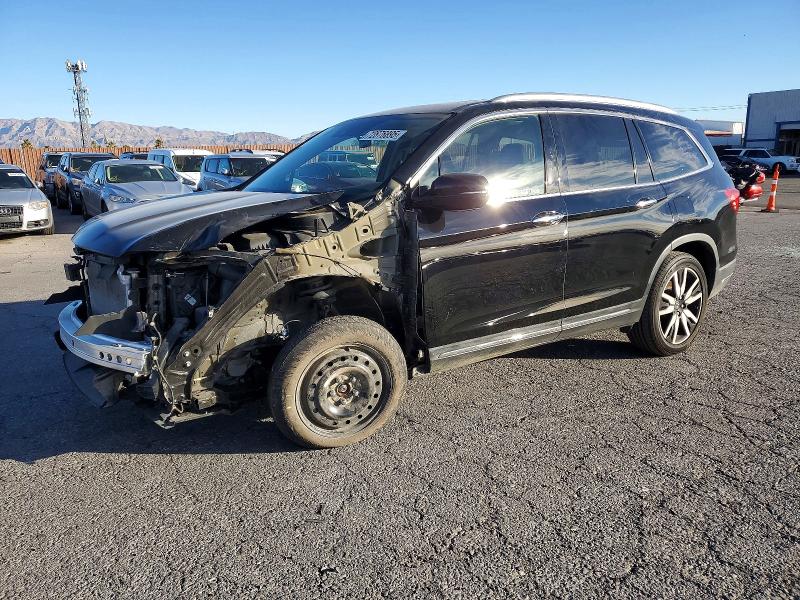 HONDA PILOT ELIT 2022 with VIN 5FNYF6H00NB066744 - Photo from auction