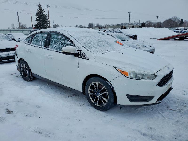 Photo 4 from auction – 2015 FORD FOCUS with VIN 1FADP3F23FL385462