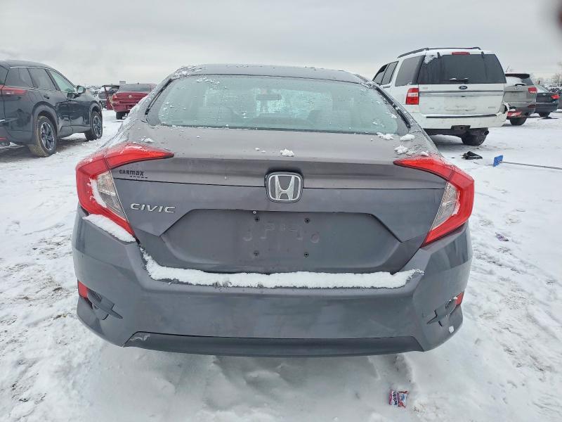 Photo 6 from auction – 2016 HONDA CIVIC LX with VIN 19XFC2F52GE011499