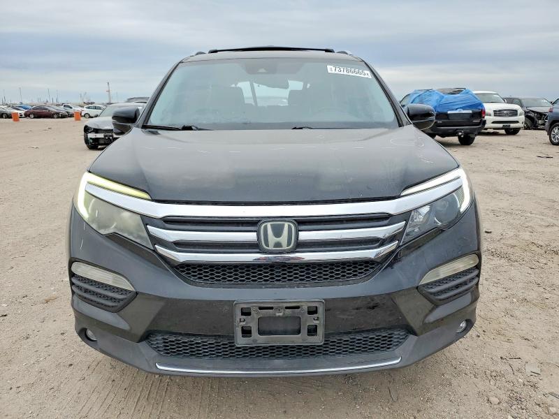 Photo 5 from auction – 2016 HONDA PILOT TOUR with VIN 5FNYF5H92GB046751