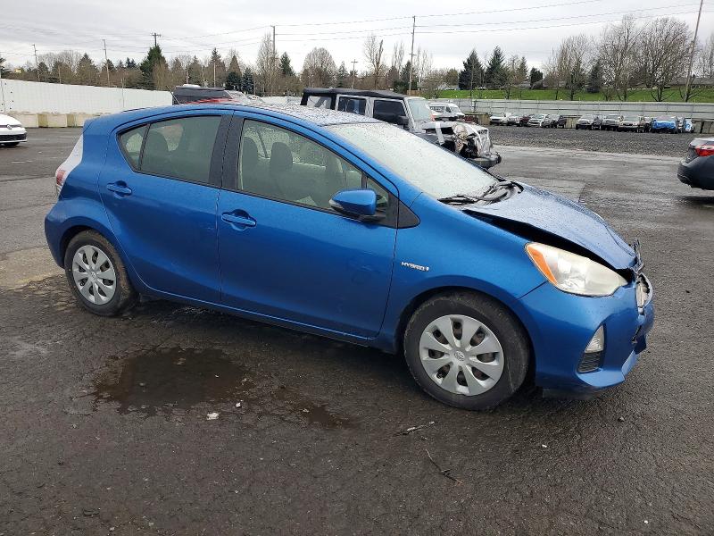 Photo 4 from auction – 2013 TOYOTA PRIUS C with VIN JTDKDTB36D1048267
