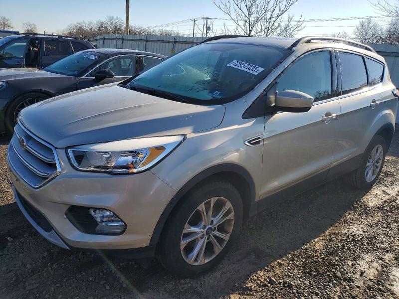 FORD ESCAPE SE 2018 with VIN 1FMCU0GD4JUC61731 - Photo from auction