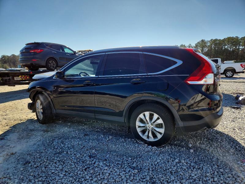 Photo 2 from auction – 2014 HONDA CR-V EXL with VIN 2HKRM3H79EH506399