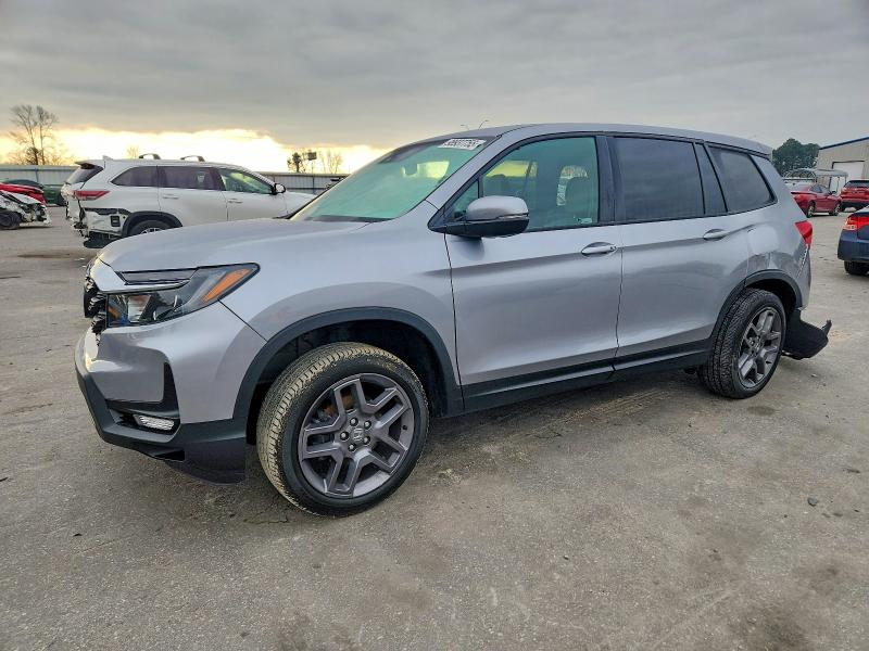 HONDA PASSPORT 2023 with VIN 5FNYF8H55PB027867 - Photo from auction