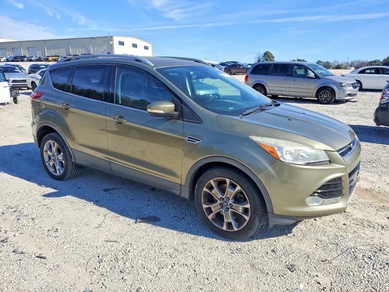 Photo 4 from auction – 2014 FORD ESCAPE TIT with VIN 1FMCU0J97EUA39856