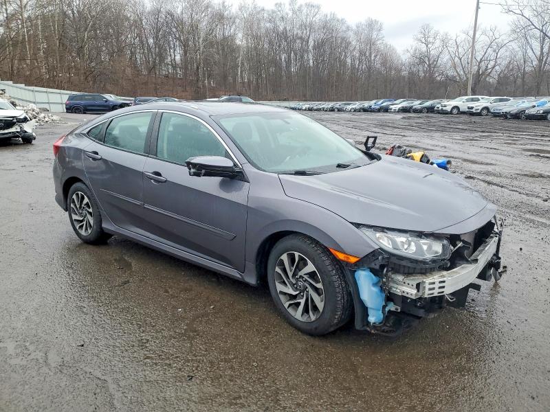 Photo 4 from auction – 2017 HONDA CIVIC EX with VIN 2HGFC2F70HH545318