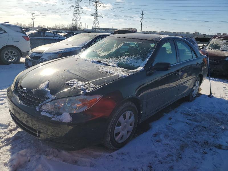TOYOTA CAMRY 2002 with VIN 4T1BE32KX2U584313 - Photo from auction