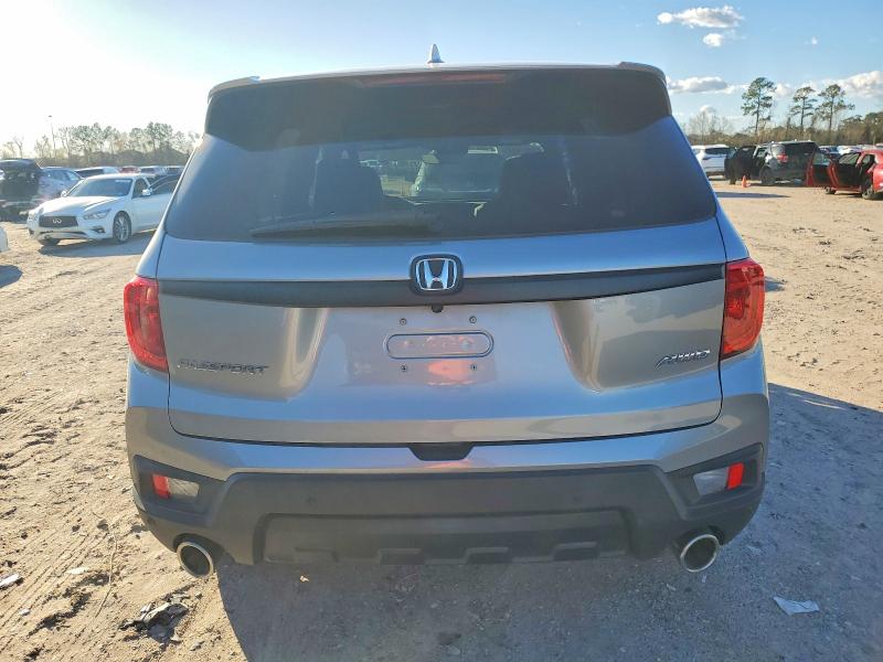 Photo 6 from auction – 2023 HONDA PASSPORT E with VIN 5FNYF8H58PB012814