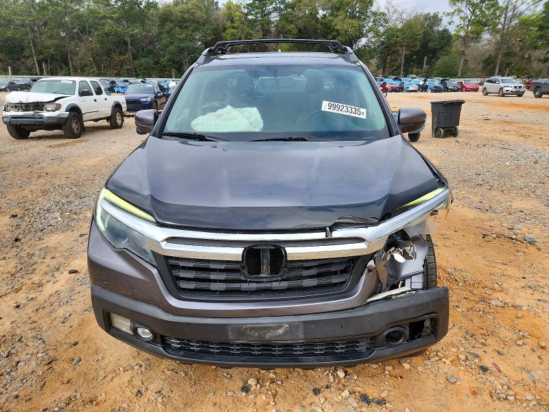 Photo 5 from auction – 2017 HONDA RIDGELINE with VIN 5FPYK2F62HB009274