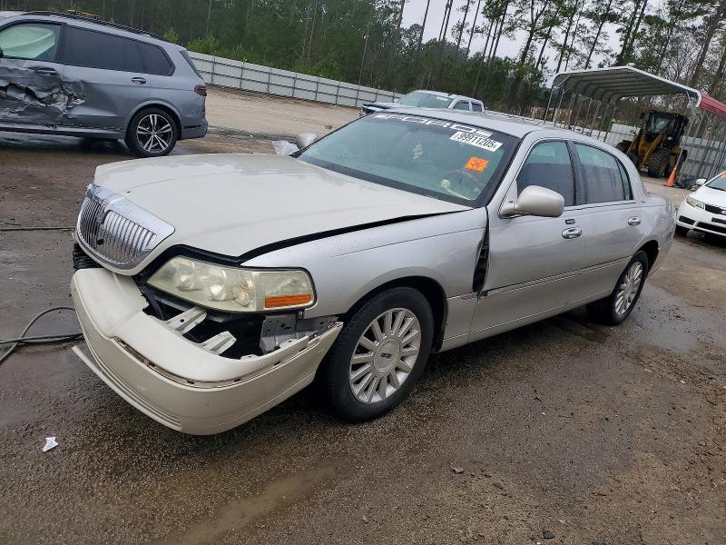 LINCOLN TOWN CAR E 2003 with VIN 1LNHM81W23Y650281 - Photo from auction
