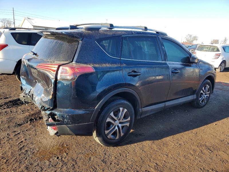 Photo 3 from auction – 2017 TOYOTA RAV4 LE with VIN 2T3ZFREV5HW313583