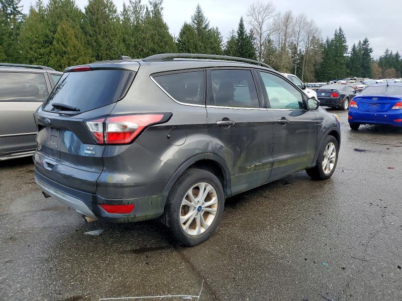 Photo 3 from auction – 2018 FORD ESCAPE SE with VIN 1FMCU9GD8JUD08120