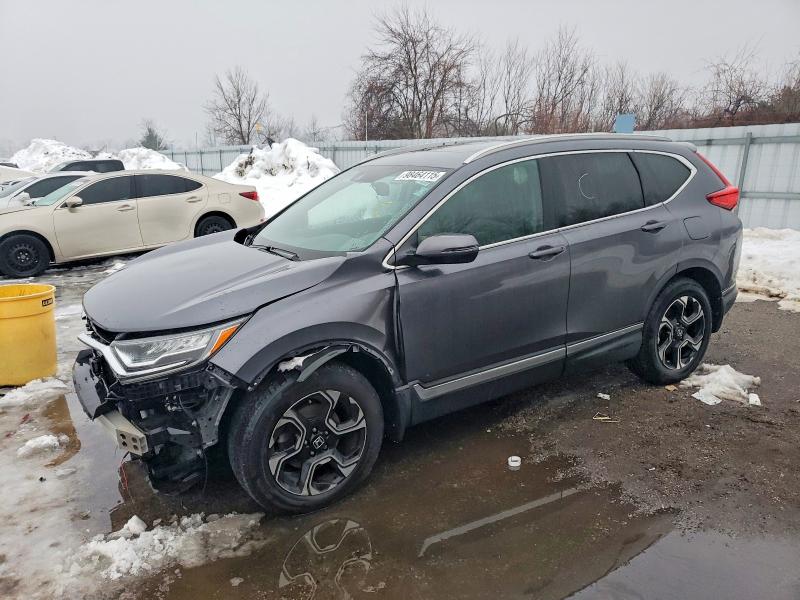 HONDA CR-V TOURI 2017 with VIN 2HKRW2H95HH101280 - Photo from auction