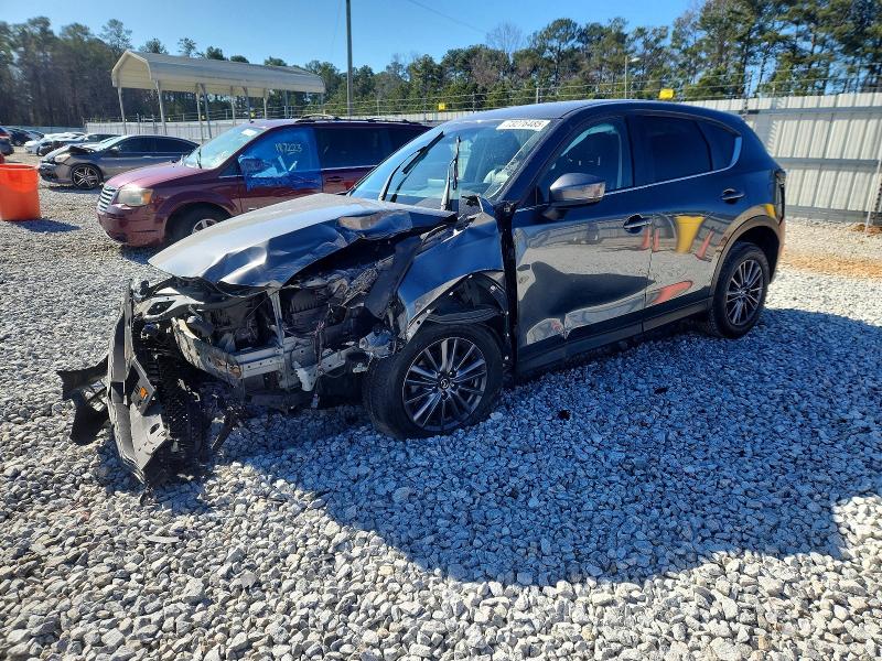 MAZDA CX-5 2021 with VIN JM3KFACM6M0324658 - Photo from auction