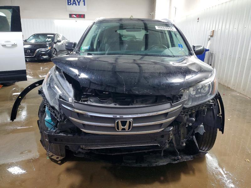 Photo 5 from auction – 2013 HONDA CR-V with VIN 2HKRM3H74DH524856