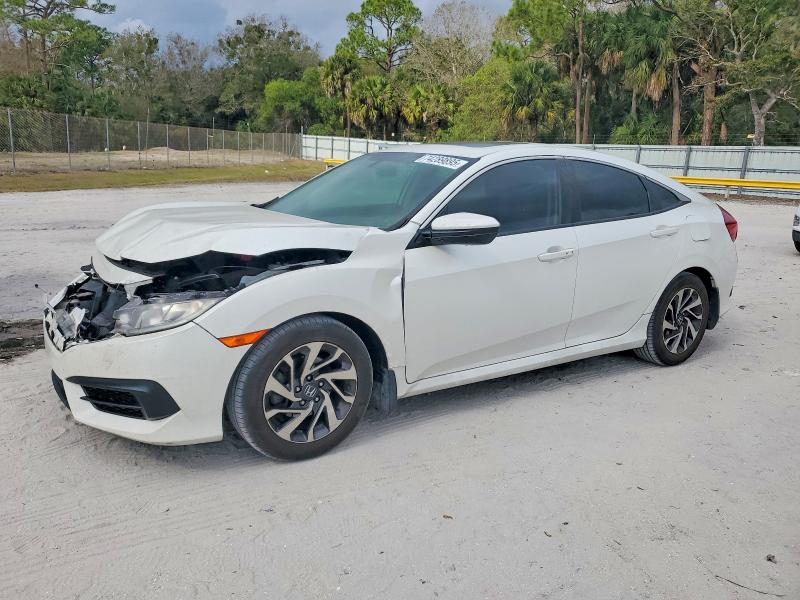 HONDA CIVIC EX 2017 с VIN 19XFC2F74HE005884 - Фото с аукциона