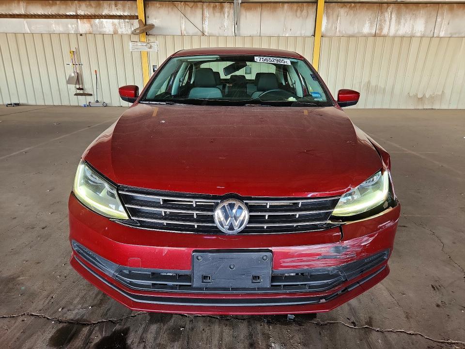 Photo 5 from auction – 2018 VOLKSWAGEN JETTA S with VIN 3VW2B7AJ0JM223945