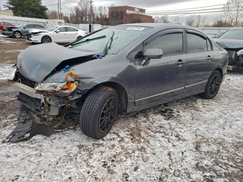 HONDA CIVIC LX 2010 with VIN 2HGFA1F50AH301558 - Photo from auction