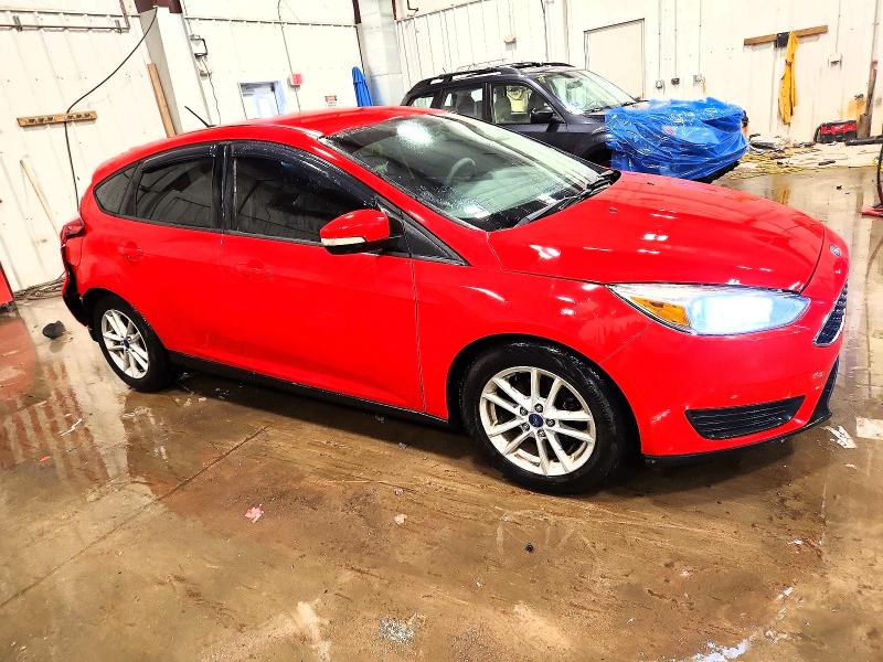 Photo 4 from auction – 2015 FORD FOCUS SE with VIN 1FADP3K2XFL296381
