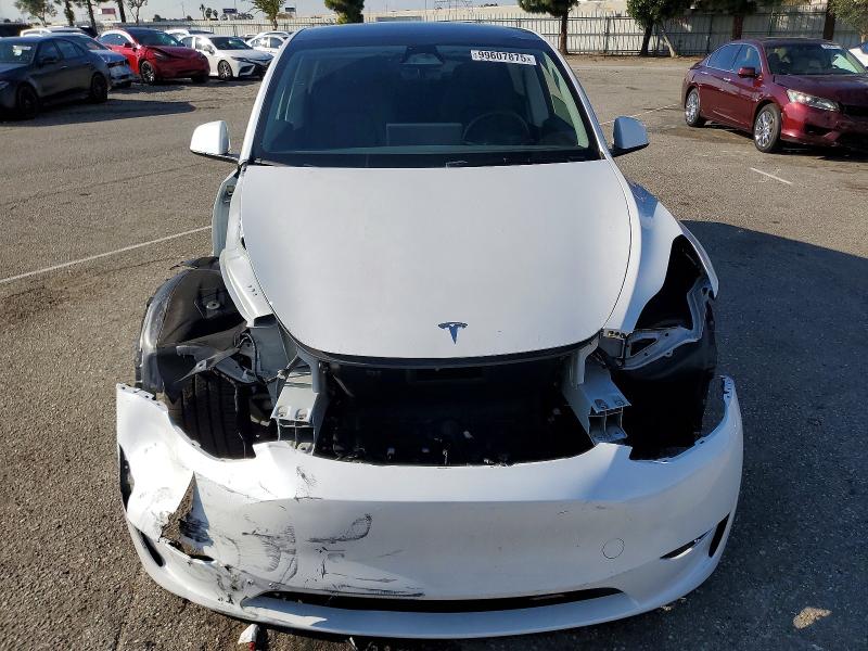 Photo 5 from auction – 2024 TESLA MODEL Y with VIN 7SAYGDEE3RA261633